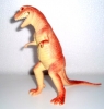 Dinosaur. Rozměry: 26 cm.
Složení materiálu: tvrzený plast. 
Barevné provedení: Červený.   